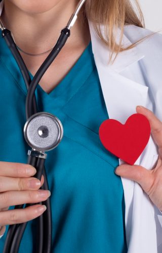 close-up-female-doctor-with-happy-red-heart-greeting